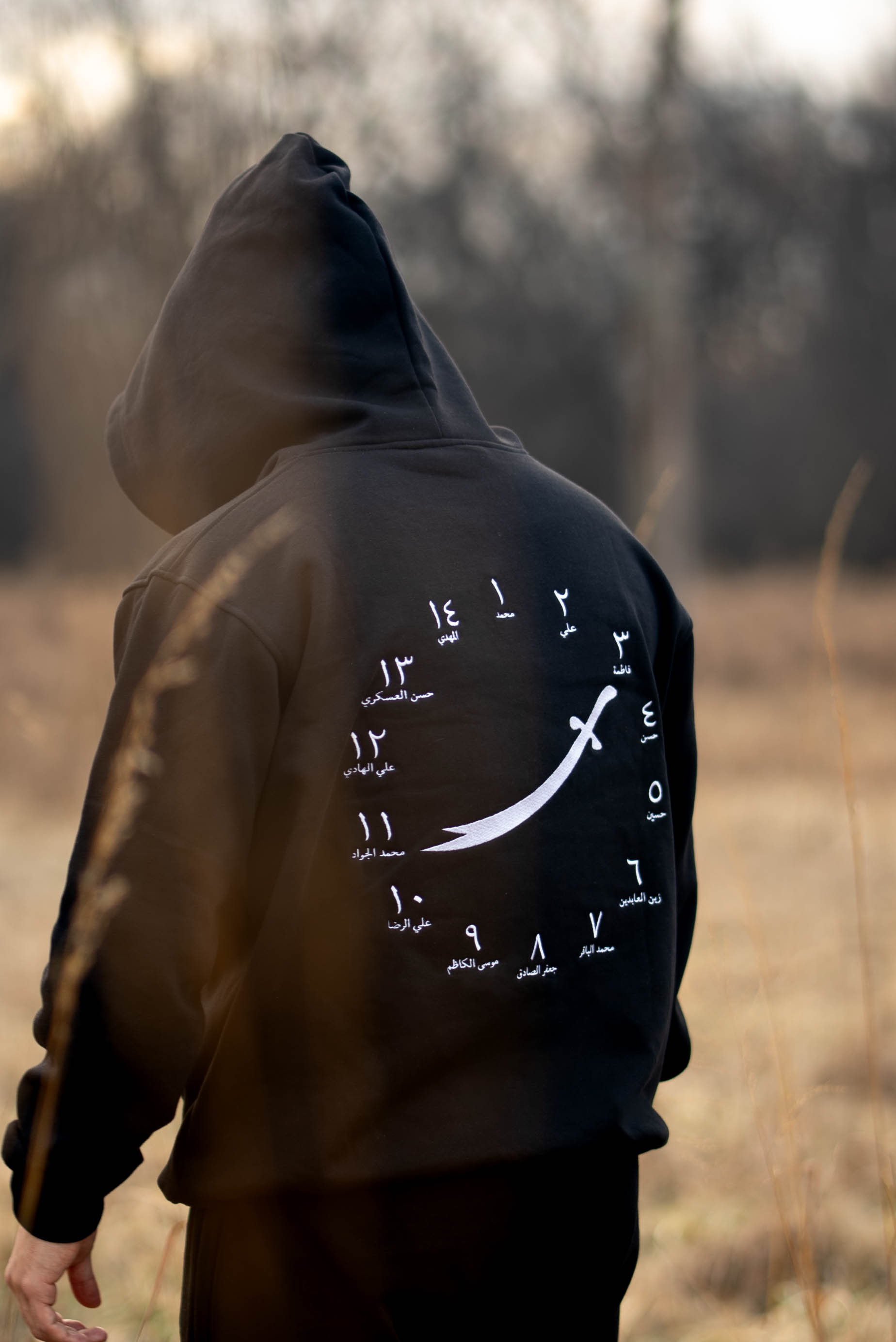 Original 40 Nights hoodie rear campaign photograph, showing the curved-sword artwork